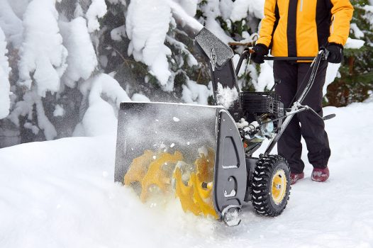 Close-up of the snowthrower ready for cleaning the snow in the winter after a snowstorm